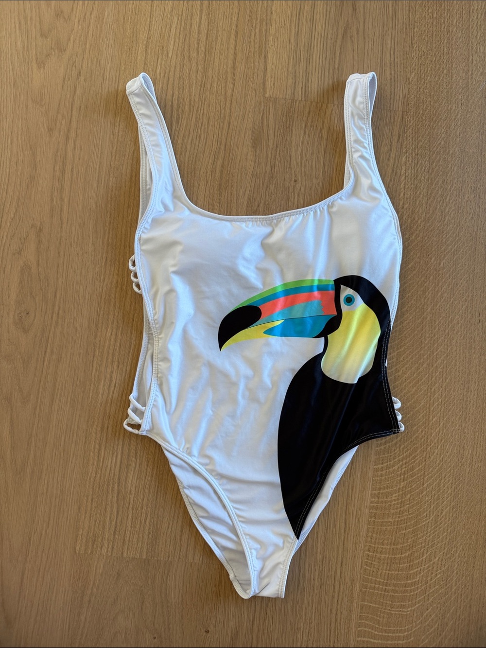 Kenny Flowers White One-Piece Swimsuit with Colorful Toucan Graphic